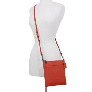 Coach North/South Swingpack Crossbody Bag Leather Orange Travel Vacation